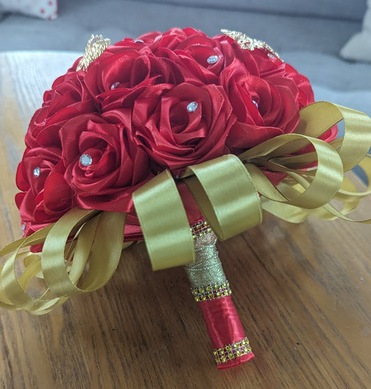 Bridal Bouquet with red silk roses with diamonds and gold butterflies.