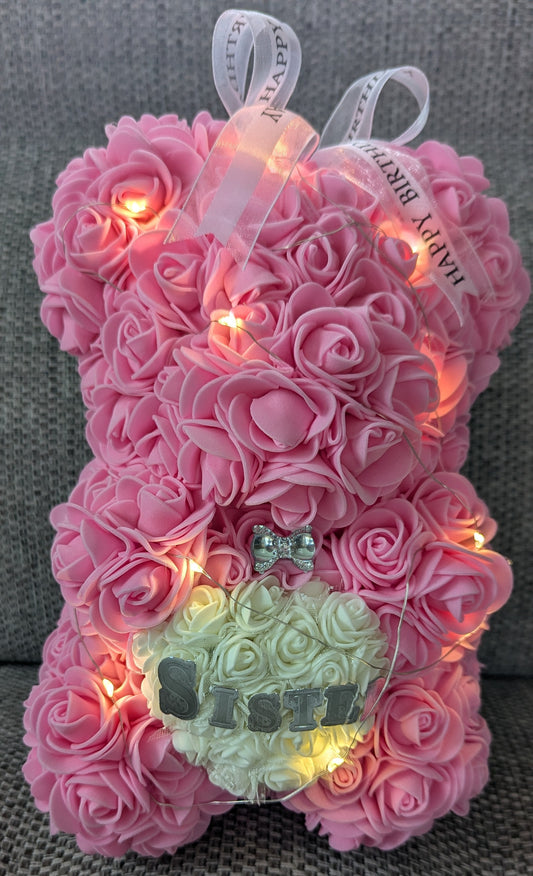 Bear with foam pink roses 🌹 with lights and white heart ❤️